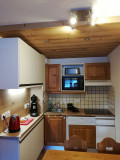 COIN CUISINE - GENTIANE 100 APPARTEMENT HAMEAU DE LA VALLEE D'OR - LES CHARBONNIERES VALLOIRE